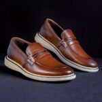 free-photo-of-leather-footwear-on-black-background