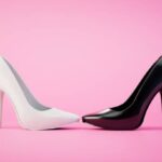 Women's confrontation. White and black high-heeled shoes on a pastel background. 3D render.